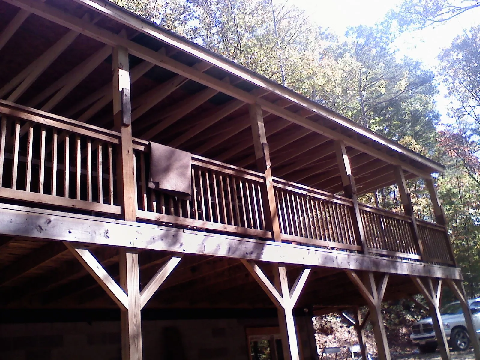 Timber framing under a new elevated porch and deck — Roof Leak Repair in Oakdale by Roofing Brothers